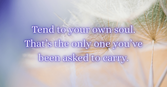 A soft-focus image of dandelion seeds in warm pastel tones of lavender, peach, and gold. Overlaid in a glowing lavender font is the quote: “Tend to your own soul. That’s the only one you’ve been asked to carry.” The image evokes a feeling of peace, self-reflection, and gentle clarity.
