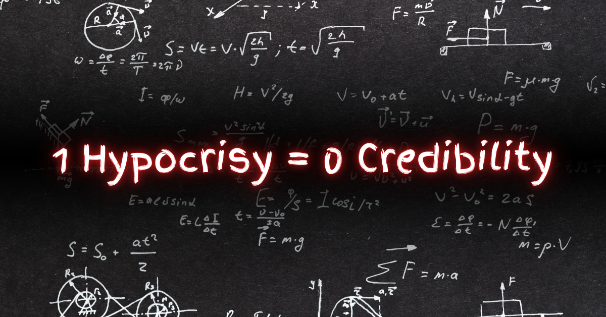 Blackboard filled with chalk-drawn math equations and diagrams, overlaid with glowing red text that reads: “1 Hypocrisy = 0 Credibility.”