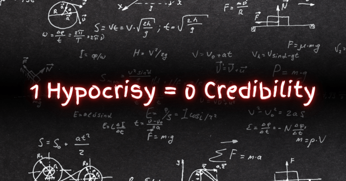 Blackboard filled with chalk-drawn math equations and diagrams, overlaid with glowing red text that reads: “1 Hypocrisy = 0 Credibility.”