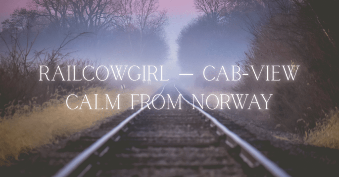 A misty railway track stretches into the distance, framed by bare winter trees under a soft purple sky. The text overlay reads: “RailCowGirl — Cab-View Calm from Norway,” reflecting the serene and meditative experience of her train cab-view videos.