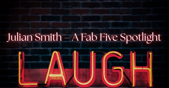 Neon red and yellow sign spelling the word “LAUGH” glows against a dark brick wall. Above it, elegant white text reads “Julian Smith – A Fab Five Spotlight.” The image evokes classic comedy, warmth, and creative nostalgia, reflecting Julian Smith’s early YouTube humor and cinematic storytelling.