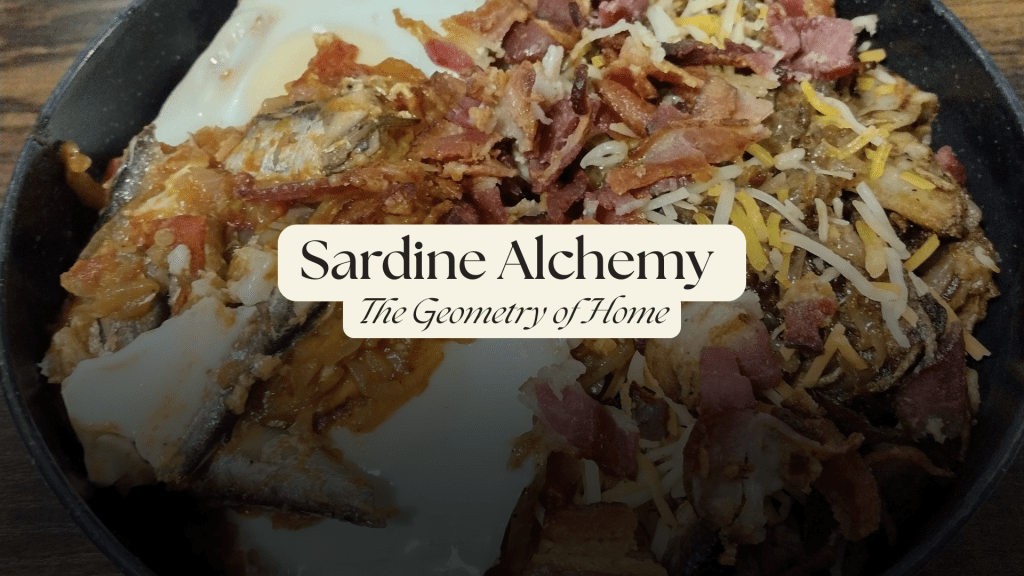 Skillet of sardines and smashed tomatoes topped with soft eggs, crispy bacon, and melted cheese.