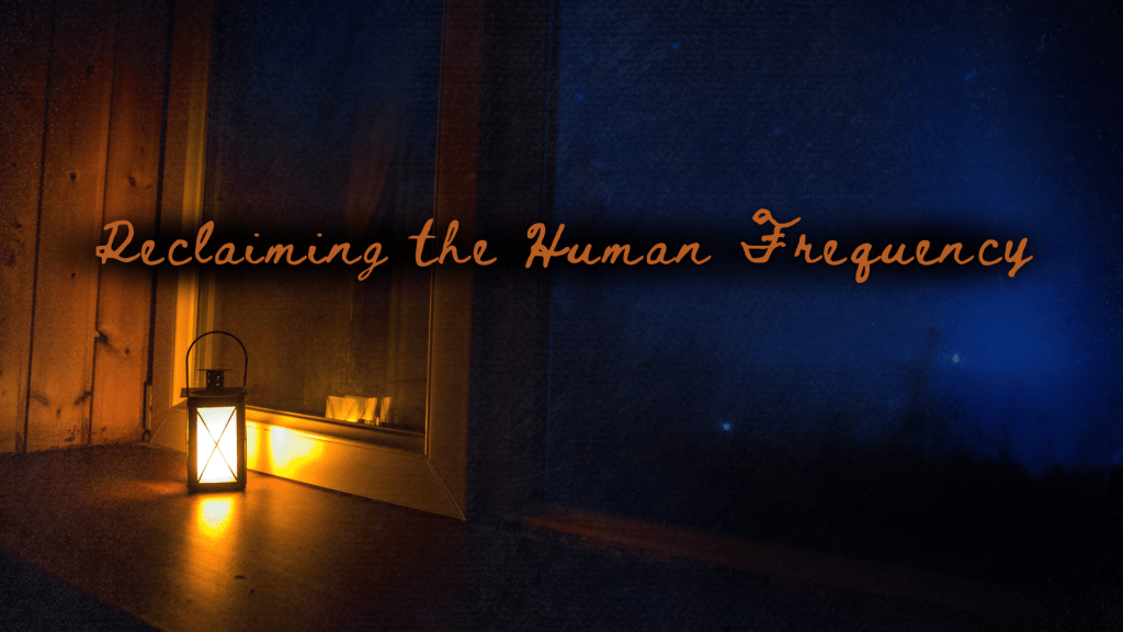A small lantern glowing warmly on a wooden windowsill at night, casting amber light inside while a deep blue night sky fills the window beyond. The words “Reclaiming the Human Frequency” appear across the image in warm script.