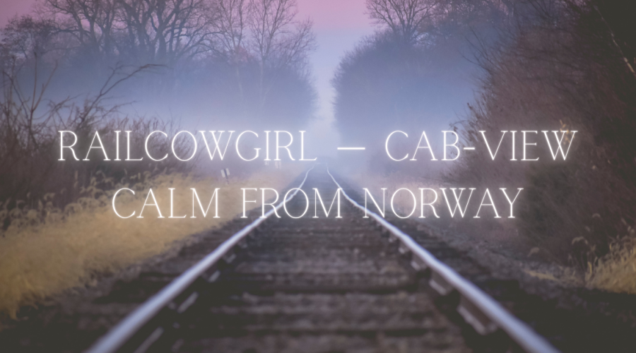A misty railway track stretches into the distance, framed by bare winter trees under a soft purple sky. The text overlay reads: “RailCowGirl — Cab-View Calm from Norway,” reflecting the serene and meditative experience of her train cab-view videos.